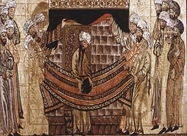 1315 illustration from the Jami al-Tawarikh, inspried by the Sirah Rasul Allah story of Muhammad and the Meccan clan elders lifting the Black Stone into place